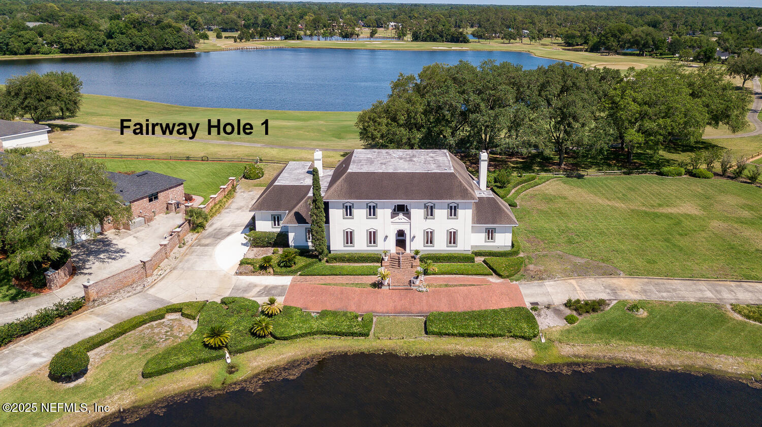 7987 Hollyridge Road Jacksonville, FL 32256 - Photo 26 of 55 an aerial view of a house with garden space and street view