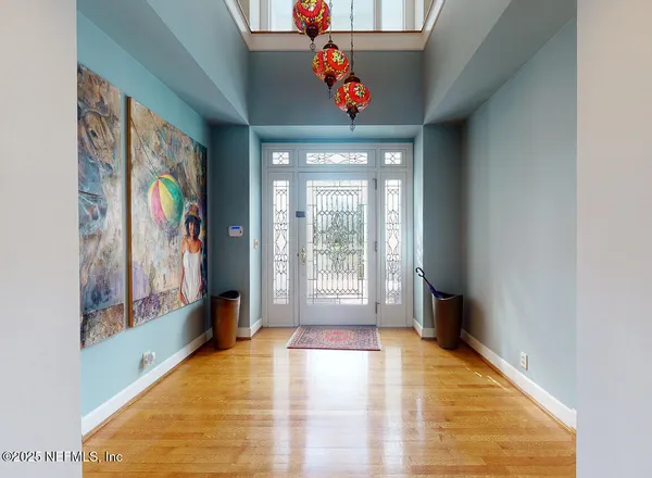 a view of a pathway both side of house