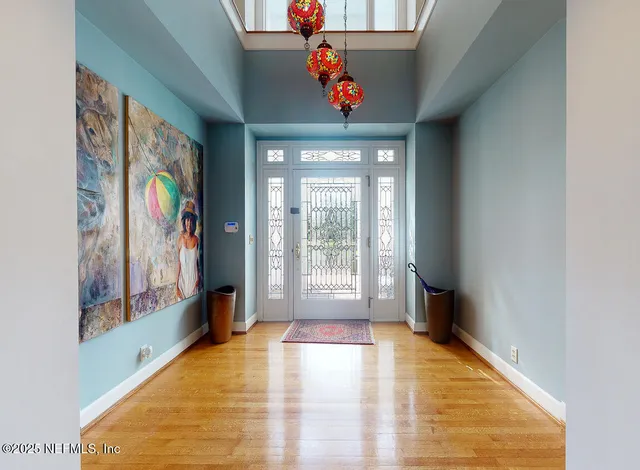a view of a pathway both side of house