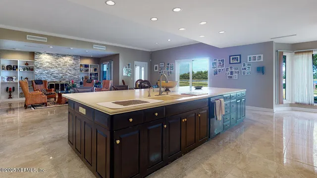 a view of a balcony with chairs and a table