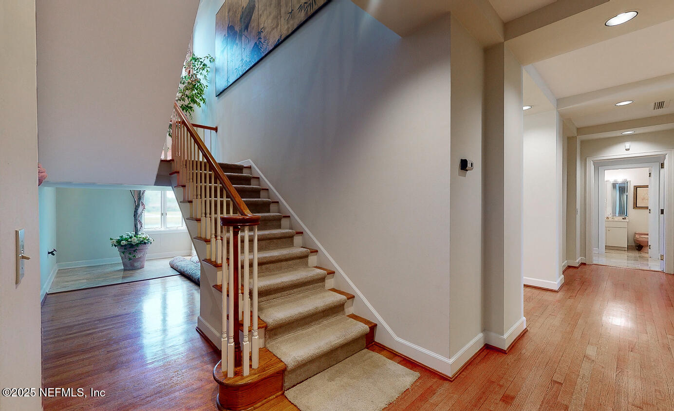 7987 Hollyridge Road Jacksonville, FL 32256 - Photo 52 of 55 a view of entryway with wooden floor