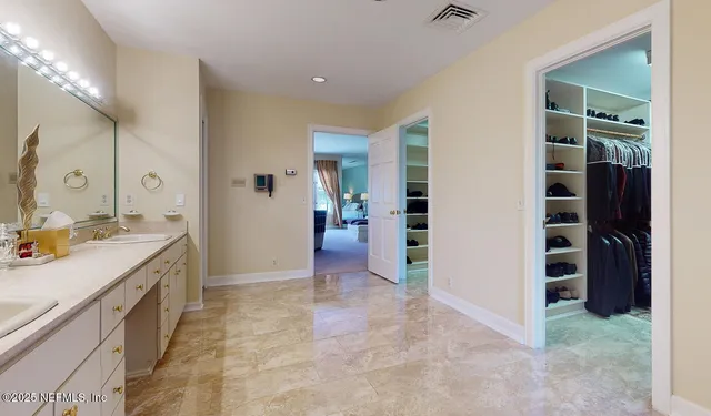 a view of a kitchen cabinets and a kitchen