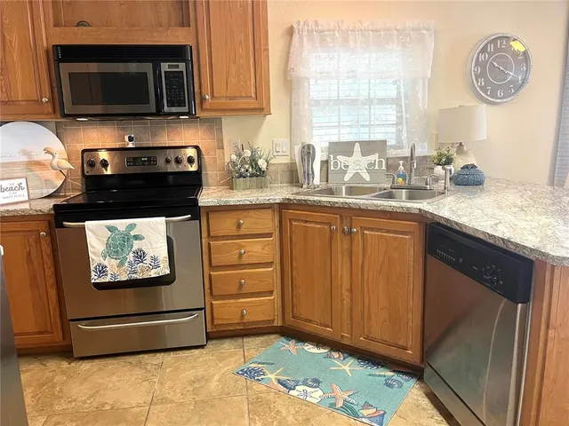 a bedroom with bed and window