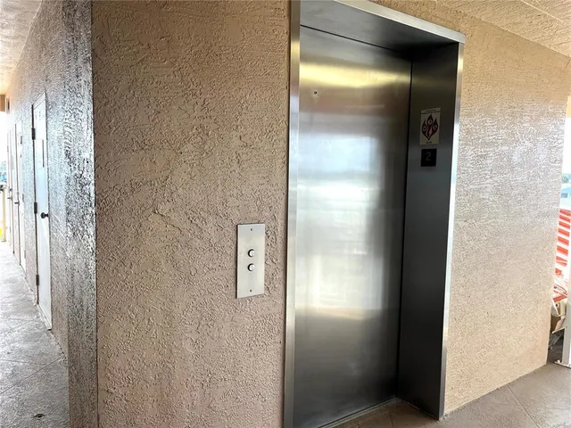 a front view of a house with glass windows