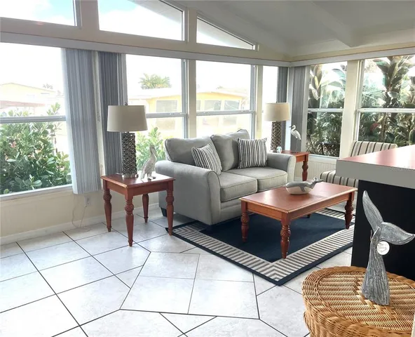a kitchen with a sink and a refrigerator