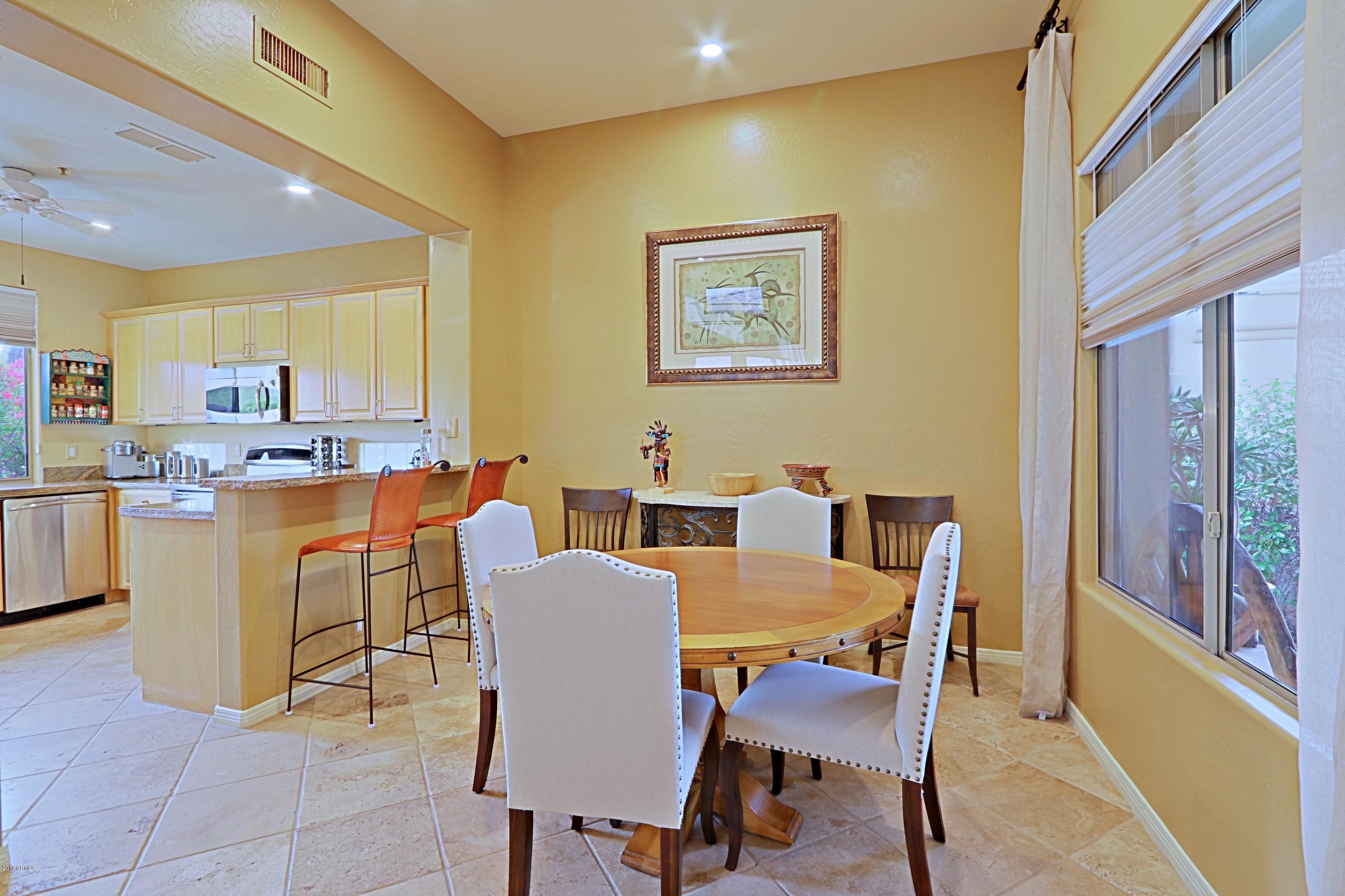6747 East Eagle Feather Road Scottsdale, AZ 85266 - Photo 14 of 73 Kitchen and Dining Area