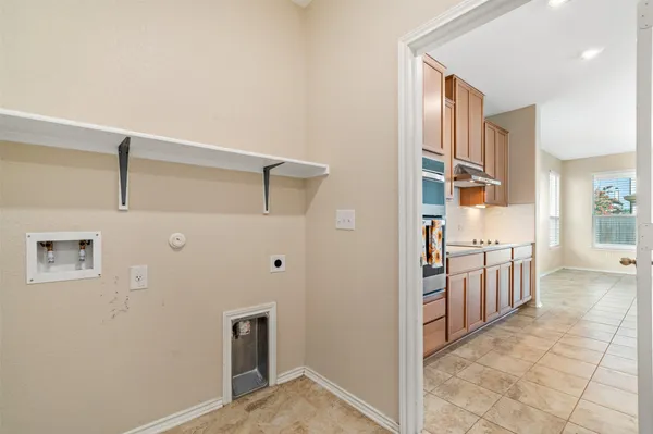 a view of a kitchen with a sink