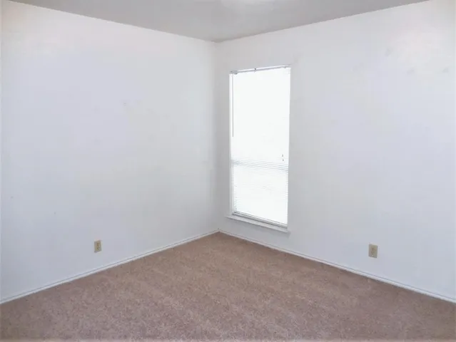 a bathroom with a sink and shower