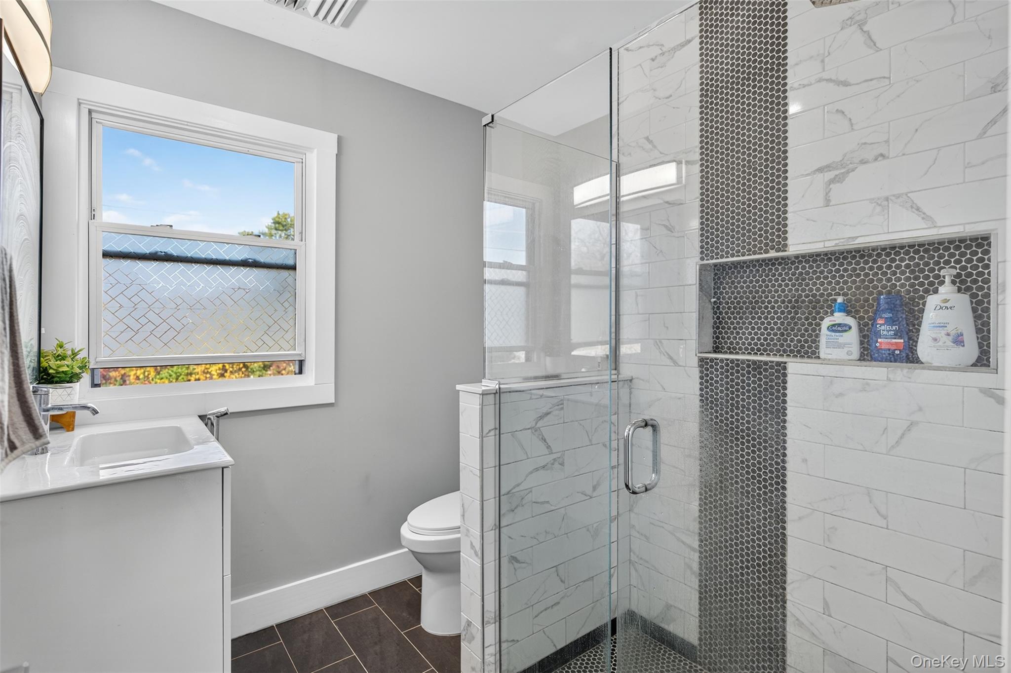 88 Spackenkill Road Poughkeepsie, NY 12603 - Photo 19 of 22 a bathroom with a sink toilet and shower