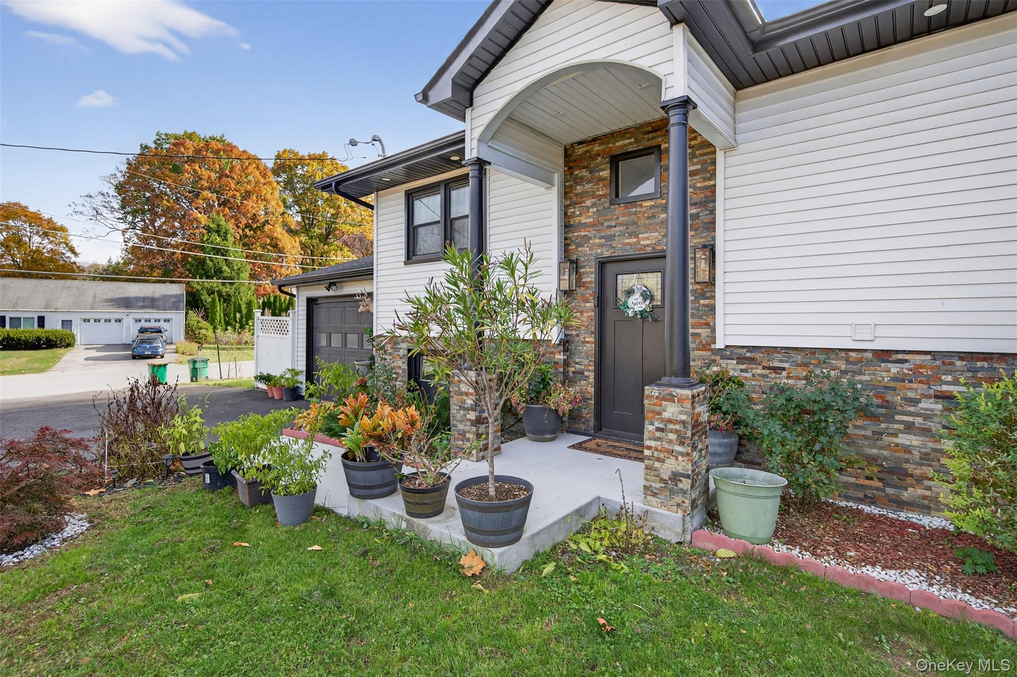 88 Spackenkill Road Poughkeepsie, NY 12603 - Photo 3 of 22 a garden view with a seating space