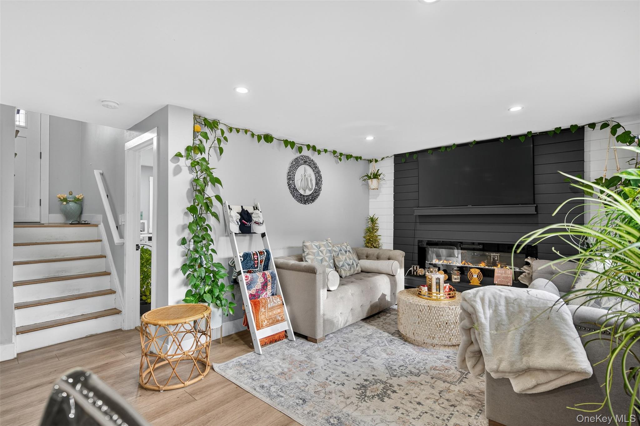 88 Spackenkill Road Poughkeepsie, NY 12603 - Photo 5 of 22 a living room with furniture and a flat screen tv
