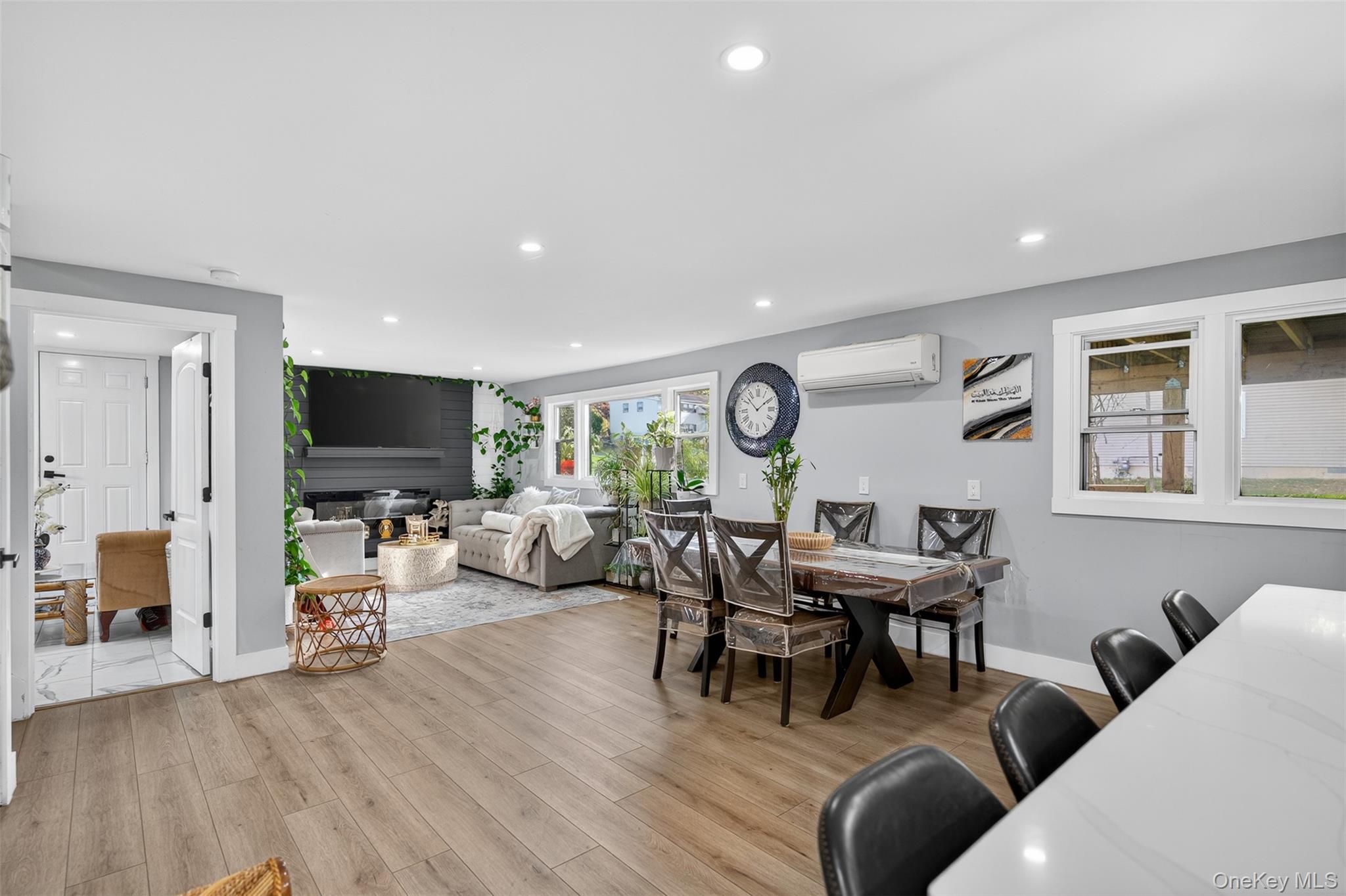 88 Spackenkill Road Poughkeepsie, NY 12603 - Photo 9 of 22 a living room with furniture a window and a flat screen tv
