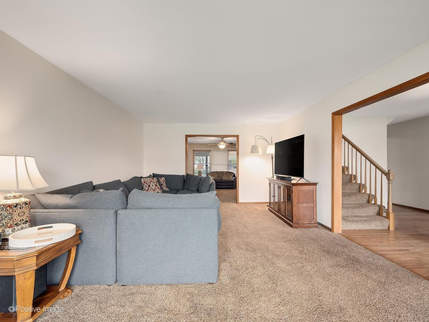 612 Stuart Drive Carol Stream, IL 60188 - Photo 3 of 29 a living room with furniture and a flat screen tv