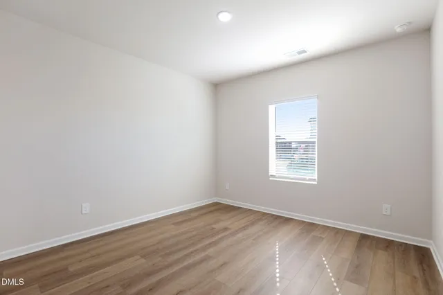 a kitchen with granite countertop a sink and stove top oven