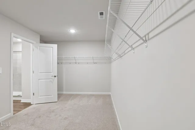 a view of a room with racks on the wall