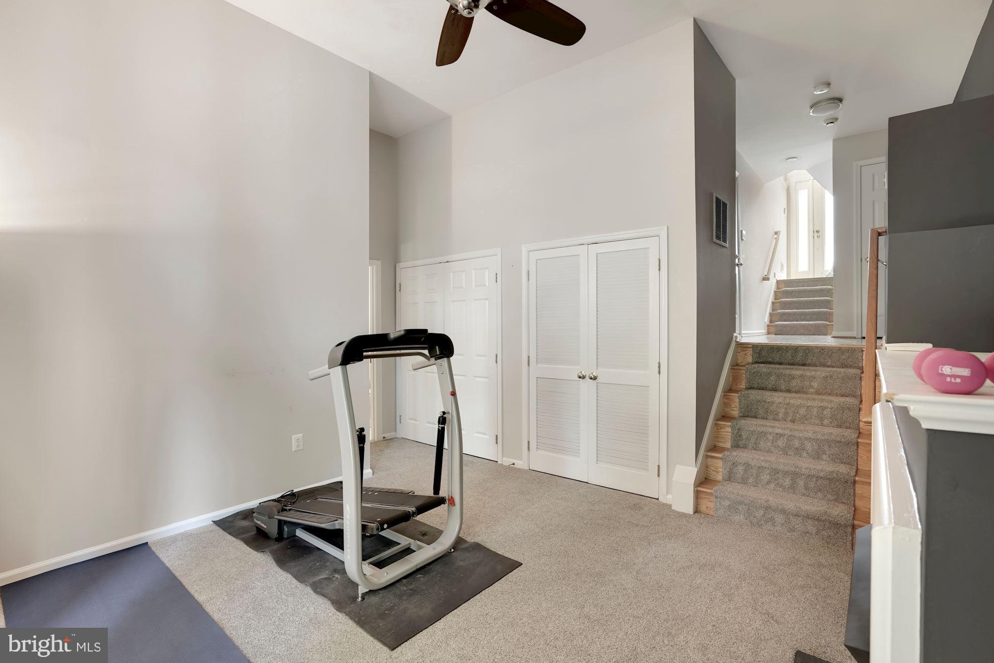 11502 Waterhaven Court Reston, VA 20190 - Photo 21 of 26 Lower Level Gym - gass fireplace, natural light