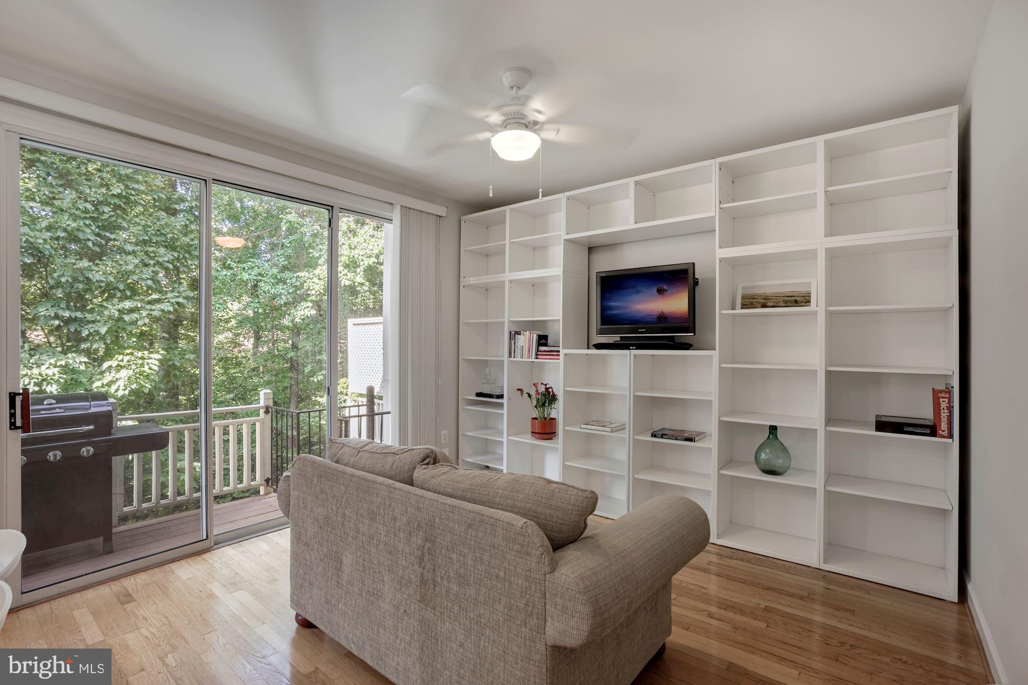 11502 Waterhaven Court Reston, VA 20190 - Photo 8 of 26 Main Level - Built ins Living Room and Deck