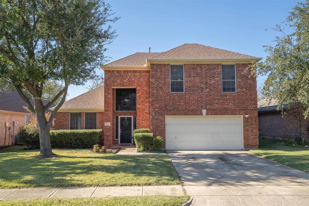 1017 Tanglewood Lane Flower Mound, TX 75028 - Photo 2 of 38 This beautiful Flower Mound home greets you with warm curb appeal and mature trees, setting the tone for a peaceful, inviting lifestyle the moment you arrive.