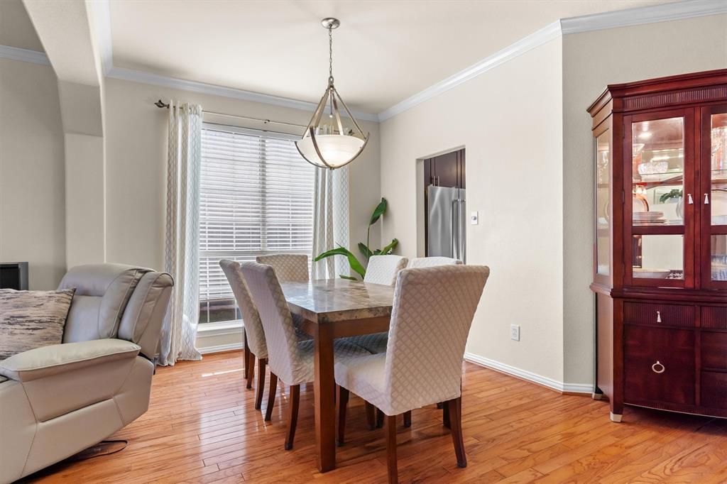1017 Tanglewood Lane Flower Mound, TX 75028 - Photo 8 of 38 Light pours in from nearby windows, creating an uplifting setting for morning coffee or long weekend brunches.