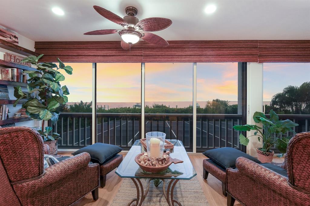 549 Buttonwood Bay Drive Boca Grande, FL 33921 - Photo 11 of 57 a living room with furniture and a large window