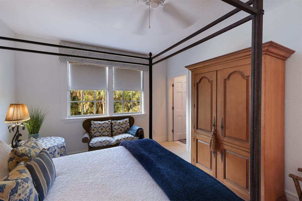 549 Buttonwood Bay Drive Boca Grande, FL 33921 - Photo 19 of 57 a bedroom with furniture and a window