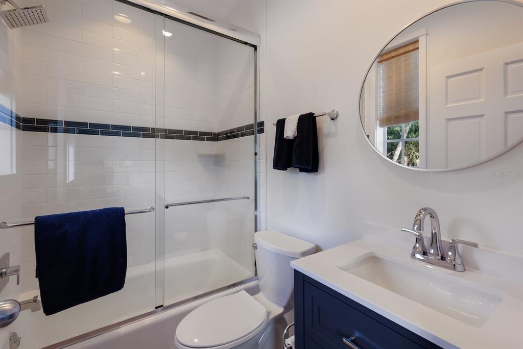 549 Buttonwood Bay Drive Boca Grande, FL 33921 - Photo 20 of 57 a bathroom with a sink toilet and shower