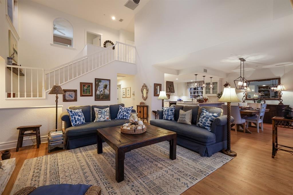 549 Buttonwood Bay Drive Boca Grande, FL 33921 - Photo 2 of 57 a living room with furniture kitchen view and a table