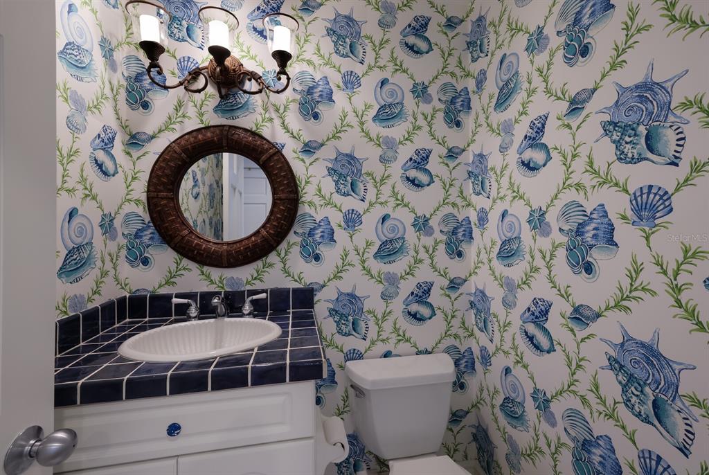 549 Buttonwood Bay Drive Boca Grande, FL 33921 - Photo 22 of 57 a bathroom with a toilet and a sink