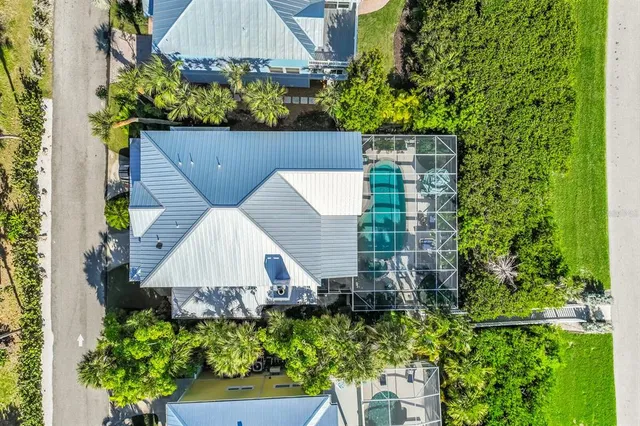 a front view of house along with green space