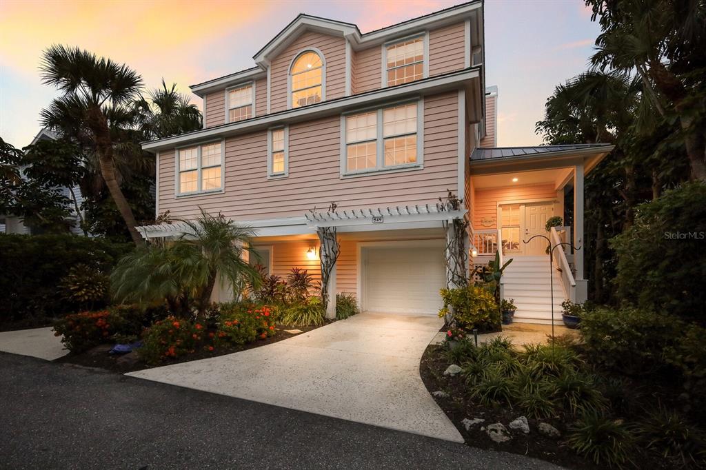 549 Buttonwood Bay Drive Boca Grande, FL 33921 - Photo 36 of 57 a front view of house along with green space