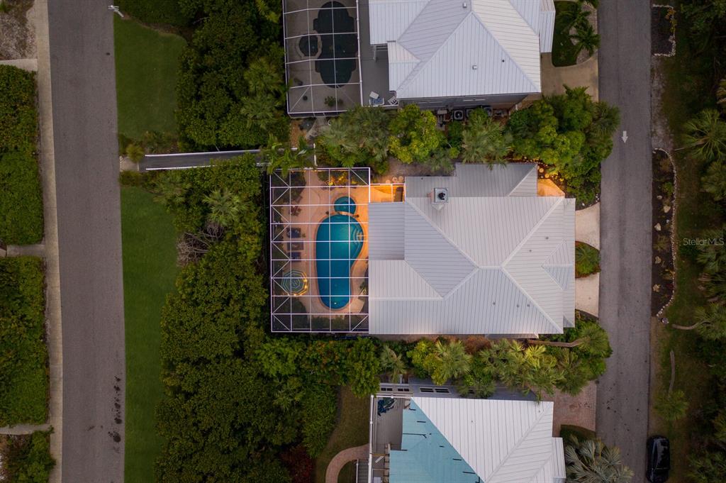 549 Buttonwood Bay Drive Boca Grande, FL 33921 - Photo 37 of 57 an aerial view of house with yard swimming pool and outdoor seating