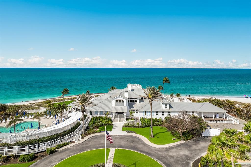 549 Buttonwood Bay Drive Boca Grande, FL 33921 - Photo 40 of 57 a view of a swimming pool with an outdoor seating