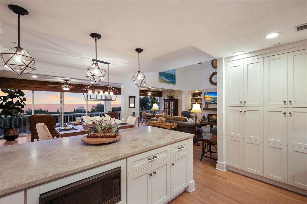 549 Buttonwood Bay Drive Boca Grande, FL 33921 - Photo 8 of 57 a kitchen with sink a stove and cabinets
