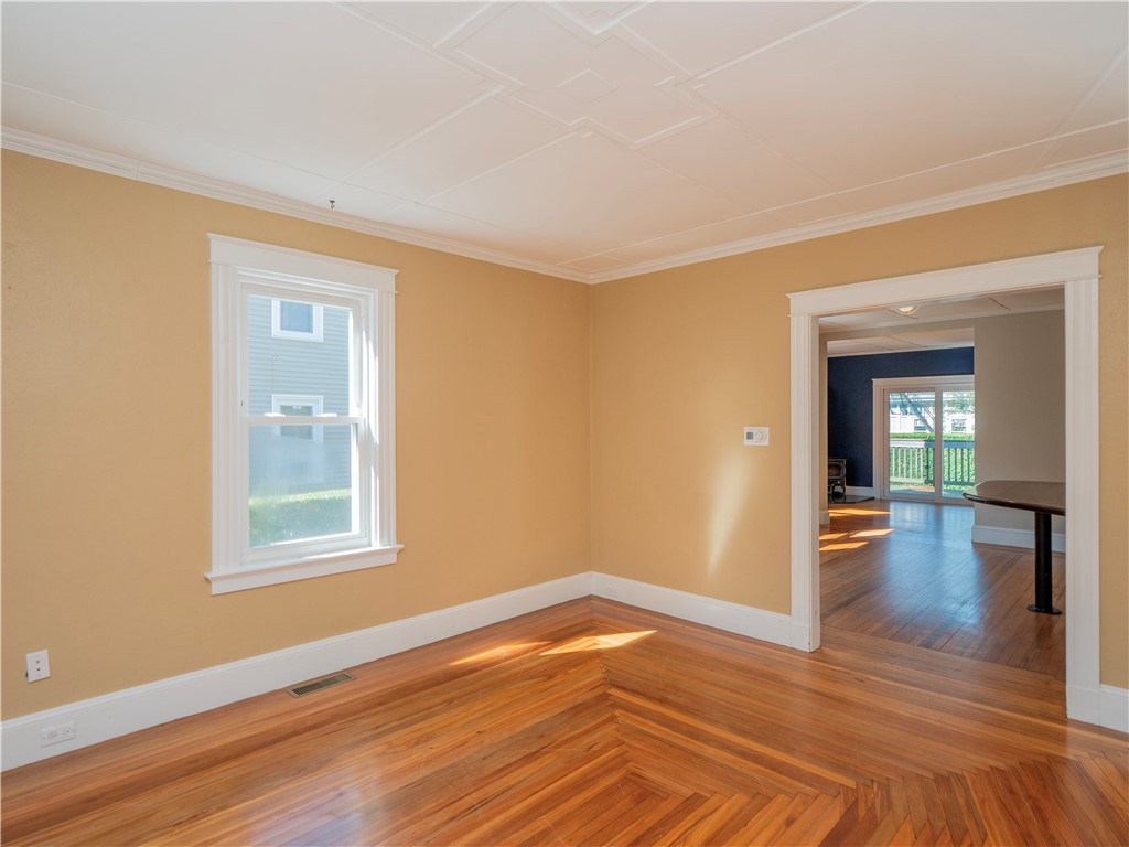573 Spring Street Newport, RI 02840 - Photo 11 of 50 Living Room view to Kitchen, Dining area & Sitting Room with wood stove