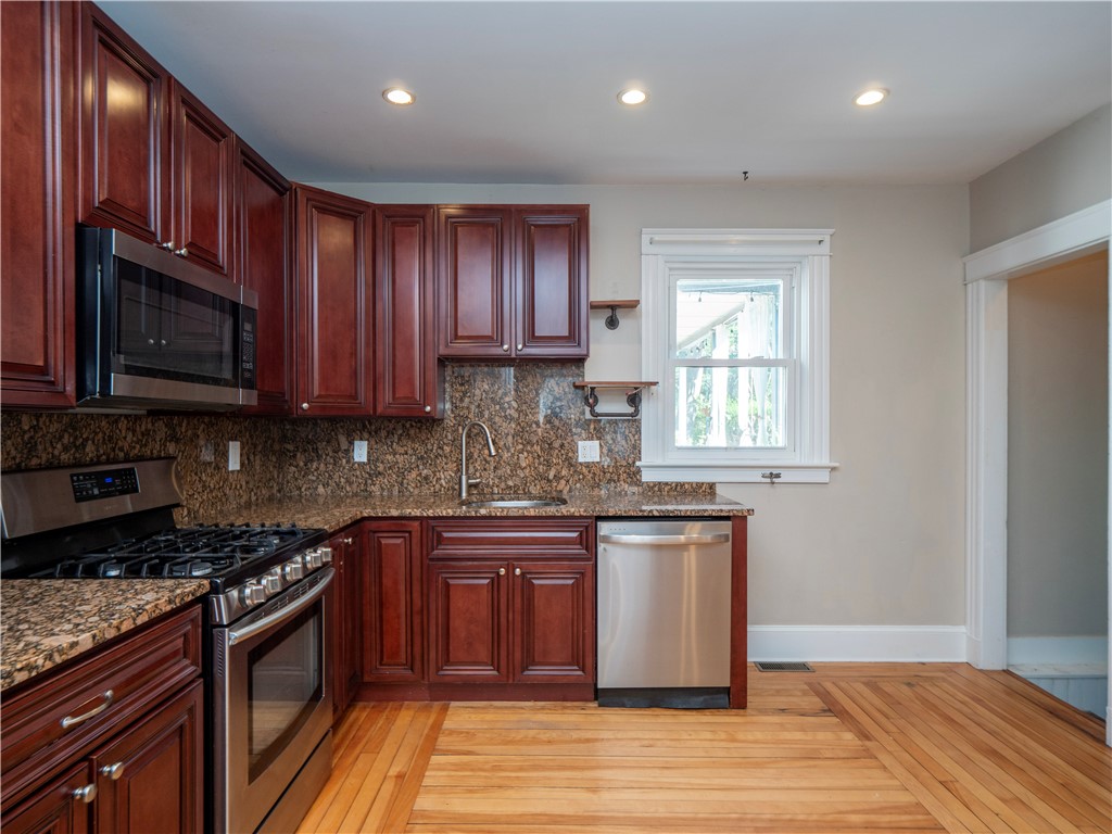 573 Spring Street Newport, RI 02840 - Photo 18 of 50 Kitchen & view to doorway to mudroom & basement stair way