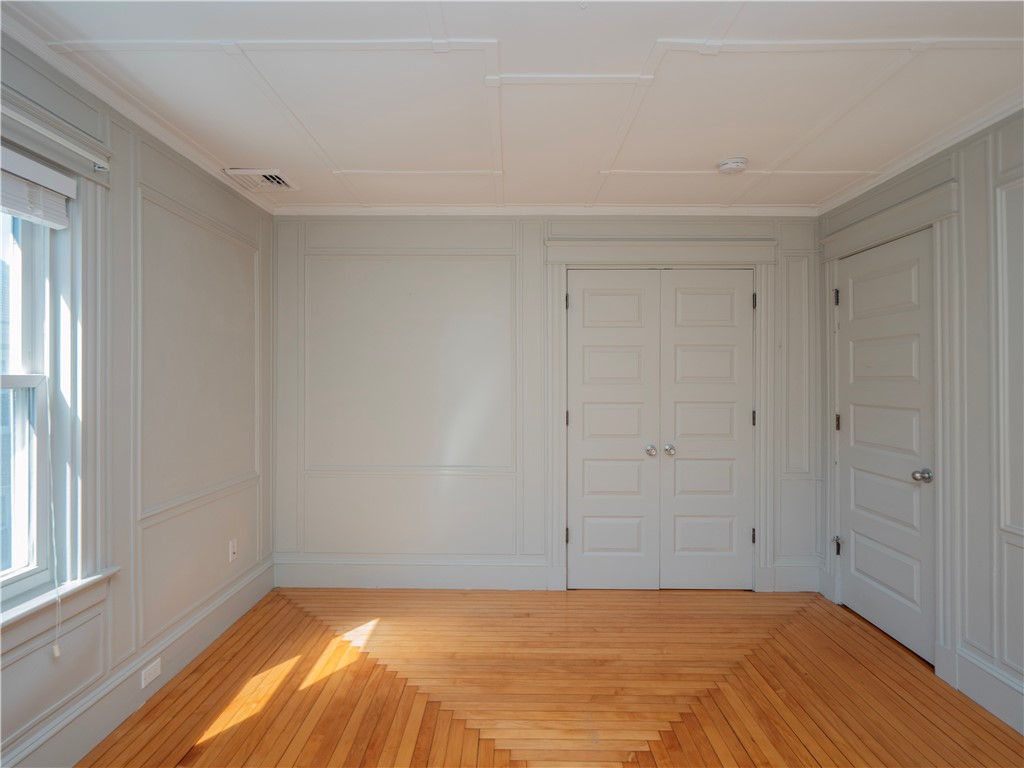 573 Spring Street Newport, RI 02840 - Photo 26 of 50 Second Floor Bedroom #2 view to closets and doorway
