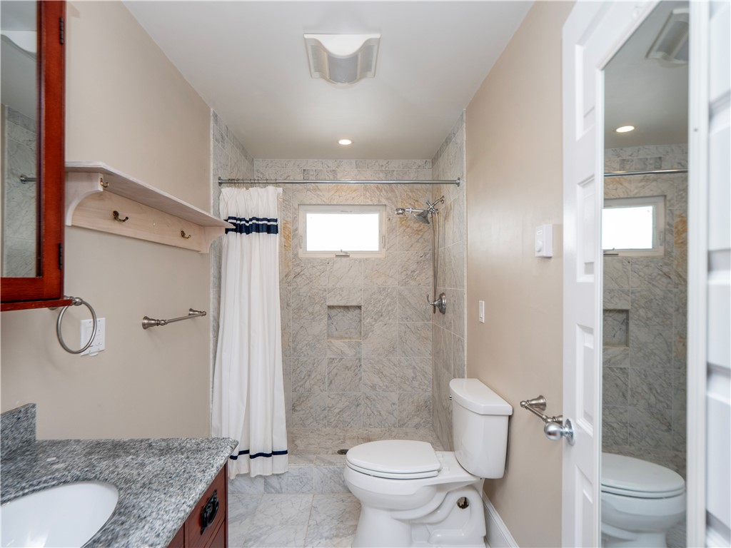 573 Spring Street Newport, RI 02840 - Photo 35 of 50 Primary bathroom with marble shower and flooring