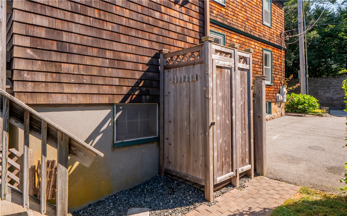 573 Spring Street Newport, RI 02840 - Photo 43 of 50 Out door shower View through gated opening to Driveway
