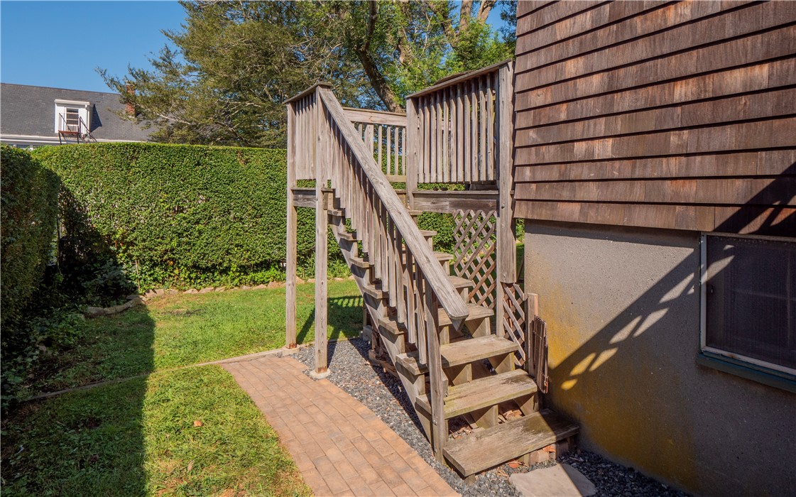 573 Spring Street Newport, RI 02840 - Photo 44 of 50 Side yard with stairs to outside deck