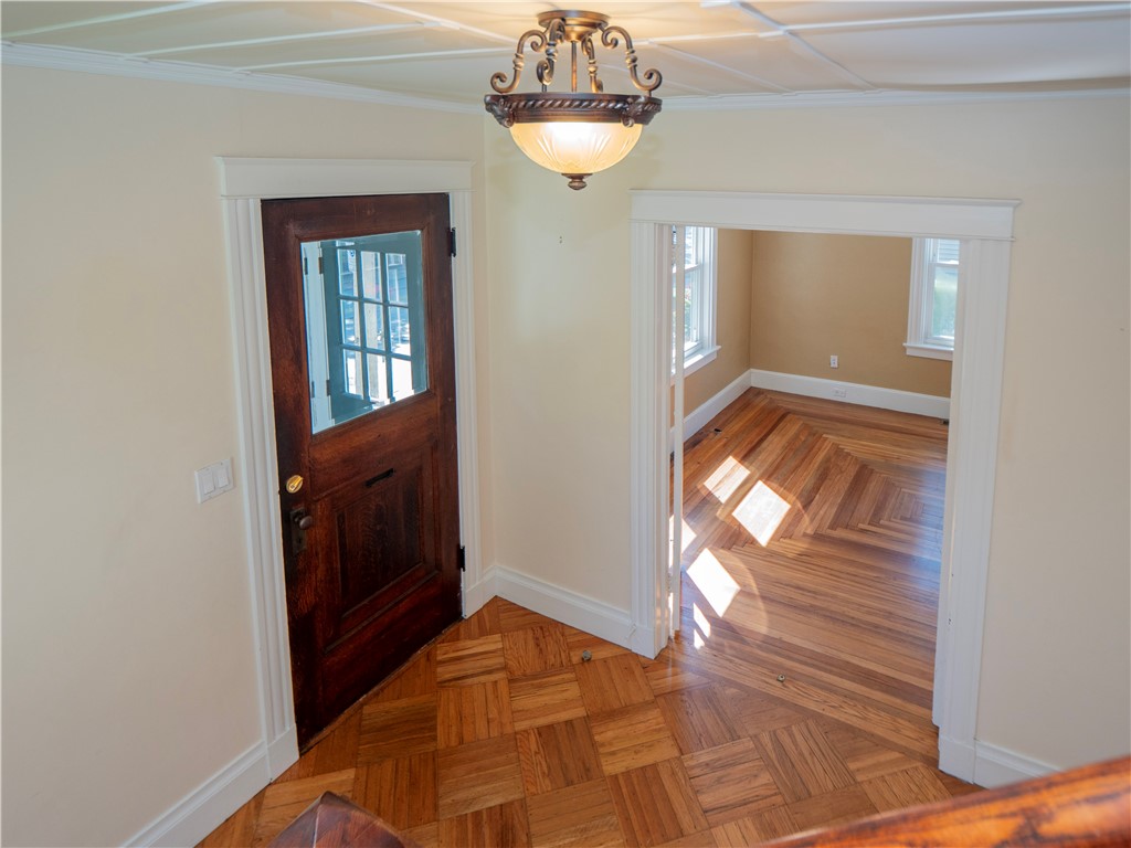 573 Spring Street Newport, RI 02840 - Photo 9 of 50 View from Stairway to Front door & Living Room