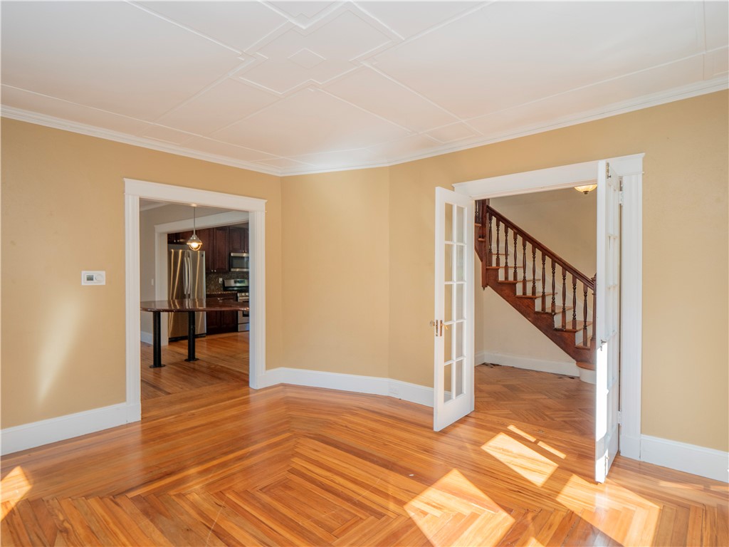 573 Spring Street Newport, RI 02840 - Photo 10 of 50 Living Room w/French Doors & view to kitchen
