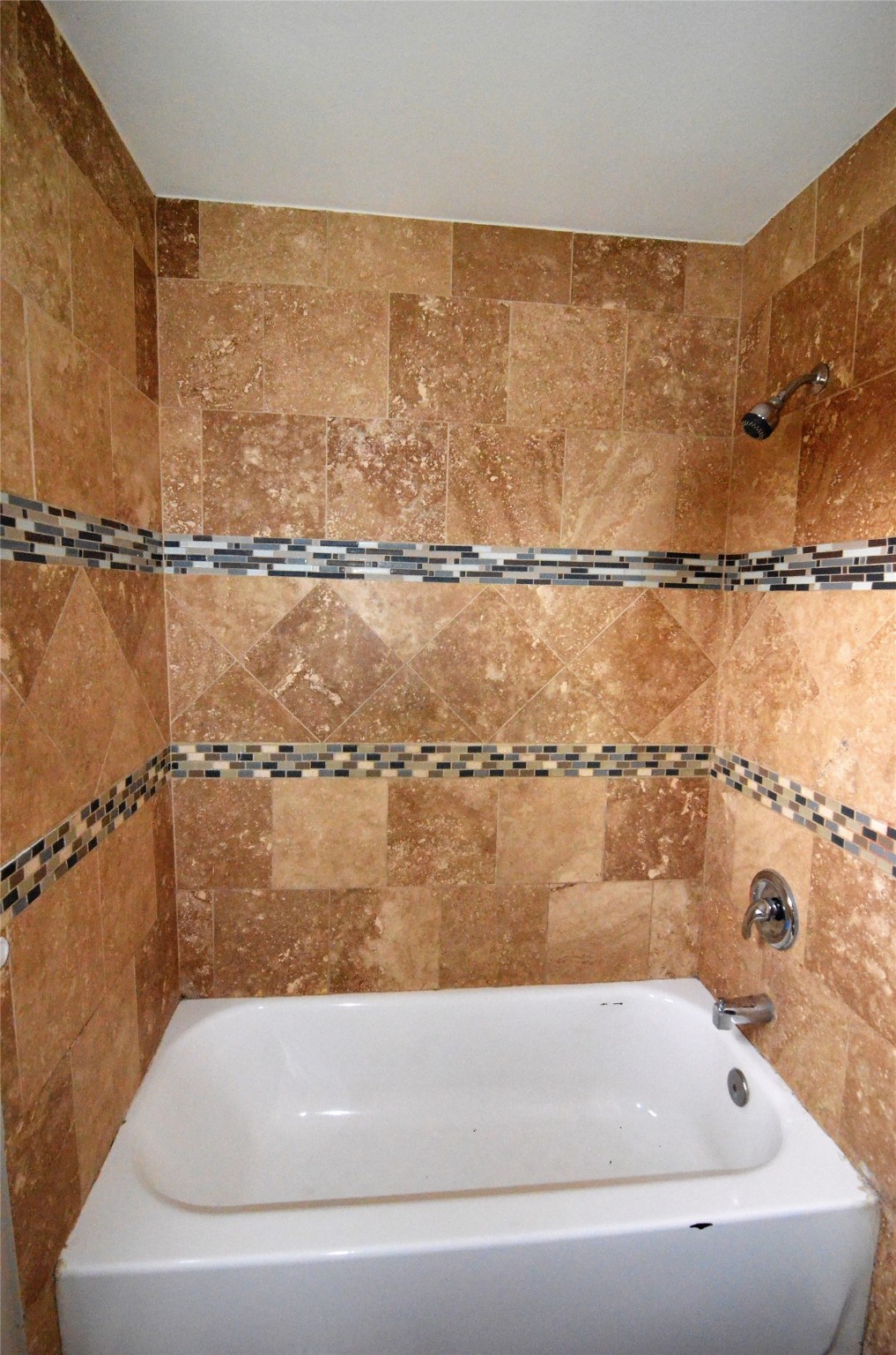 7326 Eagle Pass Street Houston, TX 77020 - Photo 15 of 26 a bathroom with a bathtub