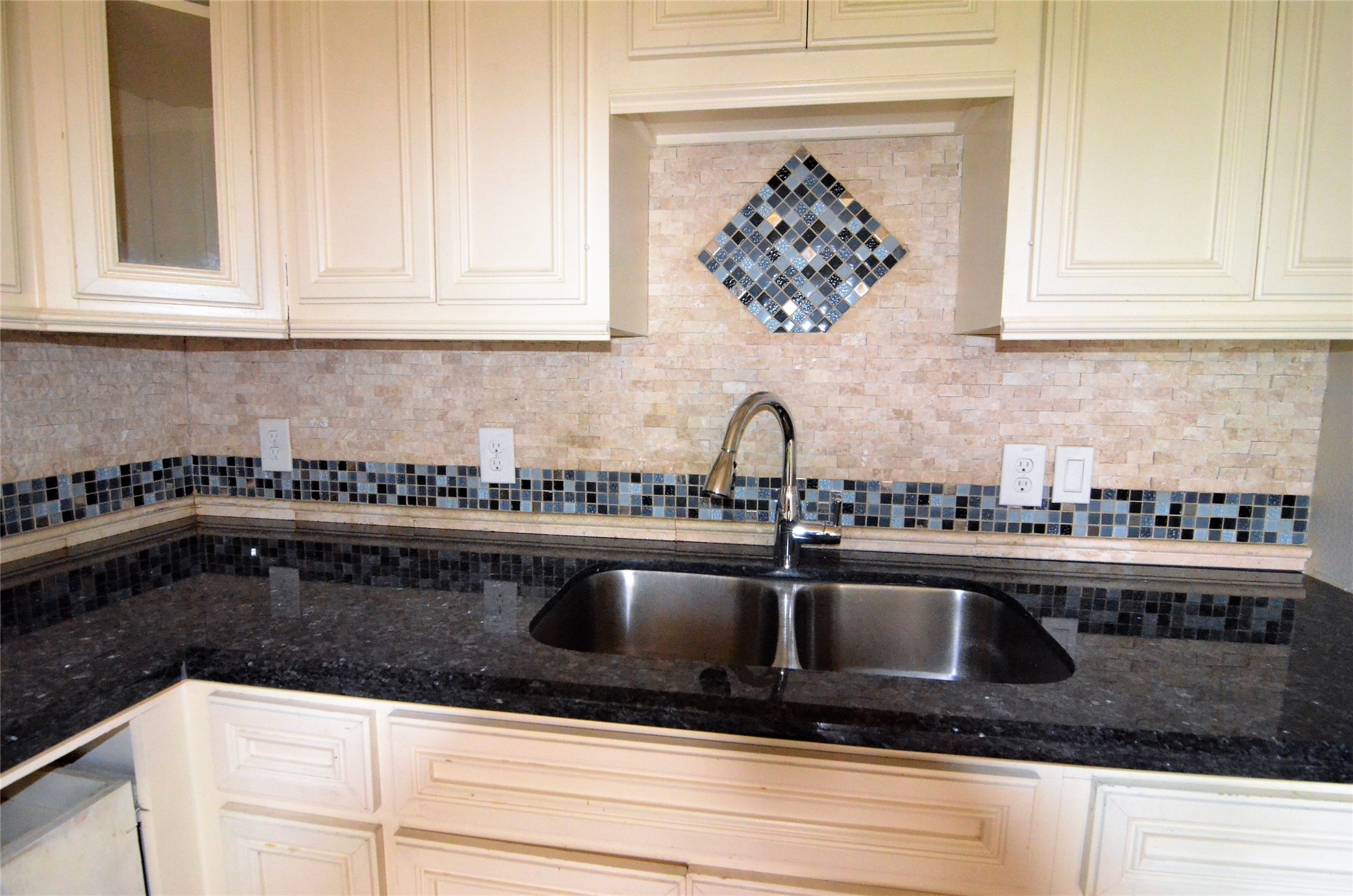 7326 Eagle Pass Street Houston, TX 77020 - Photo 20 of 26 a kitchen with a sink and cabinets