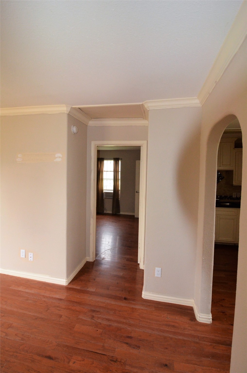 7326 Eagle Pass Street Houston, TX 77020 - Photo 8 of 26 a view of empty room with wooden floor