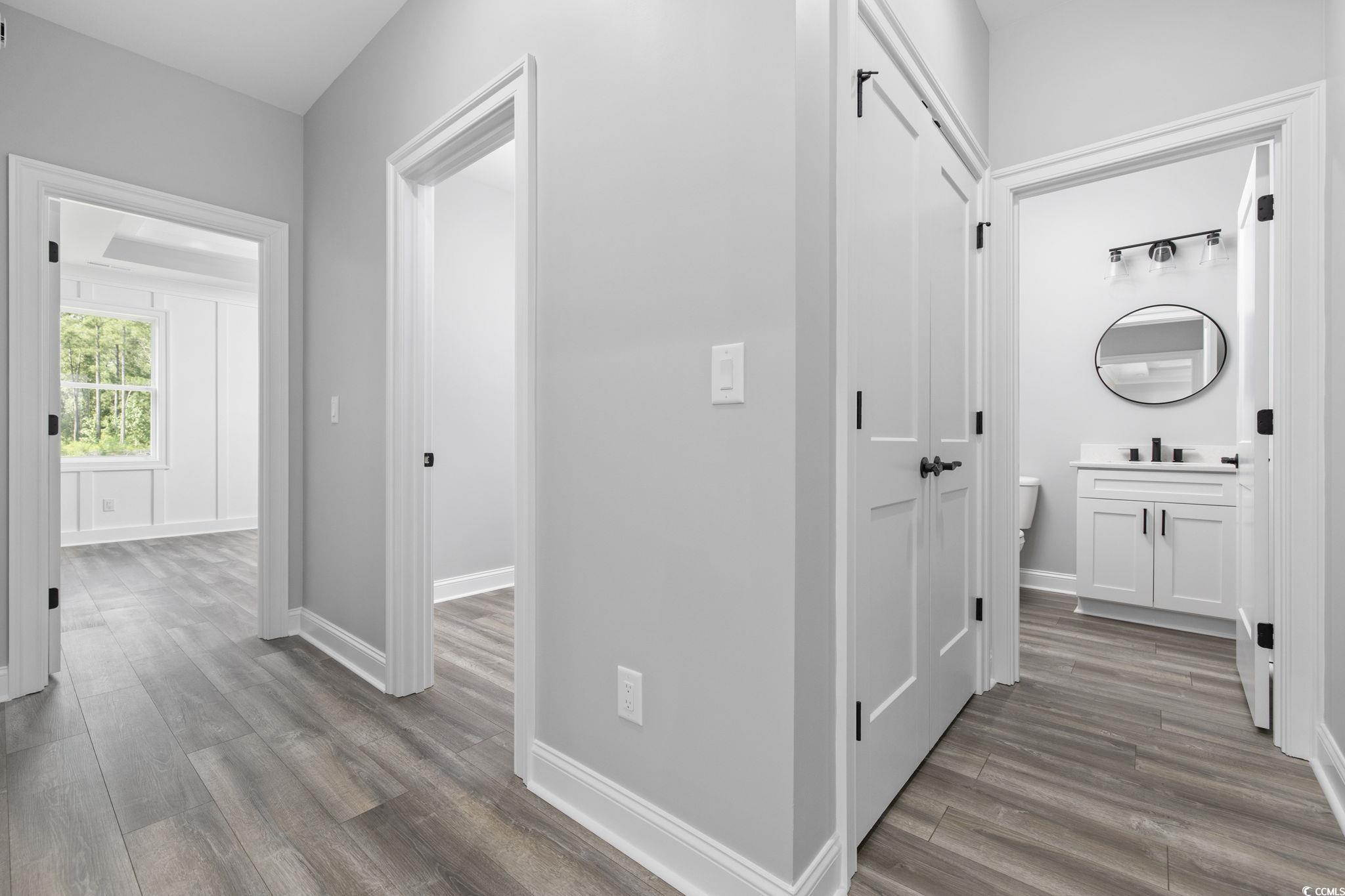 6922 Pauley Swamp Road Conway, SC 29527 - Photo 30 of 40 Hall with wood finished floors