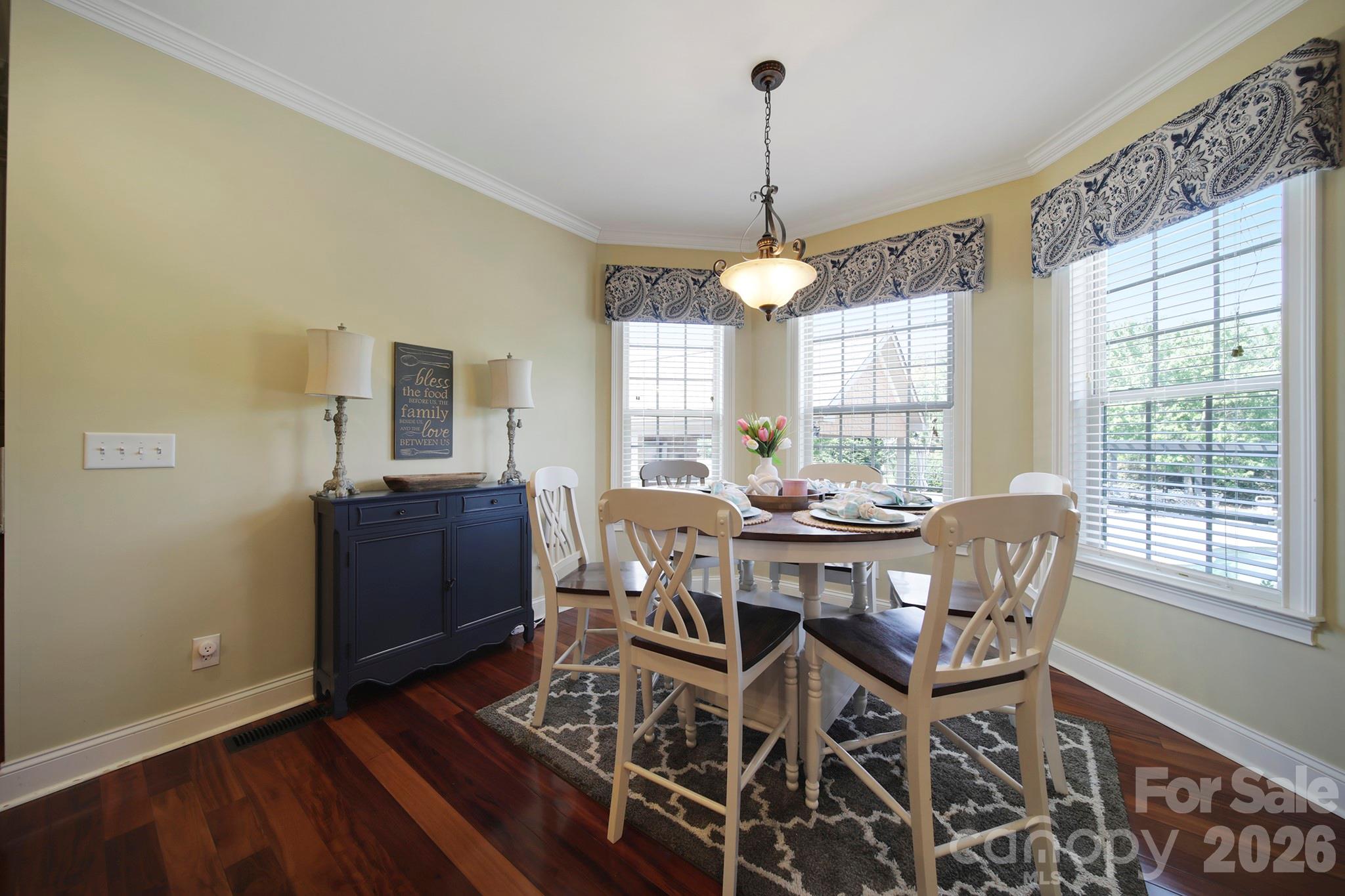 2407 Robert Usher Road Lancaster, SC 29720 - Photo 15 of 47 a view of a dining room with furniture window and wooden floor