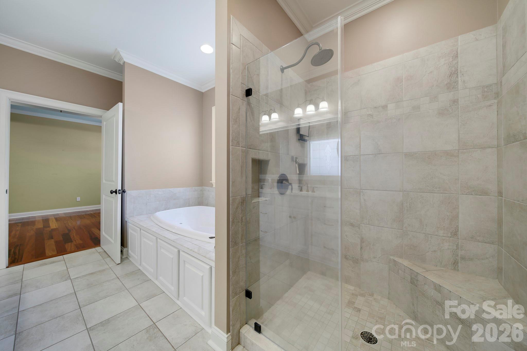 2407 Robert Usher Road Lancaster, SC 29720 - Photo 23 of 47 a spacious bathroom with a bathtub and a shower