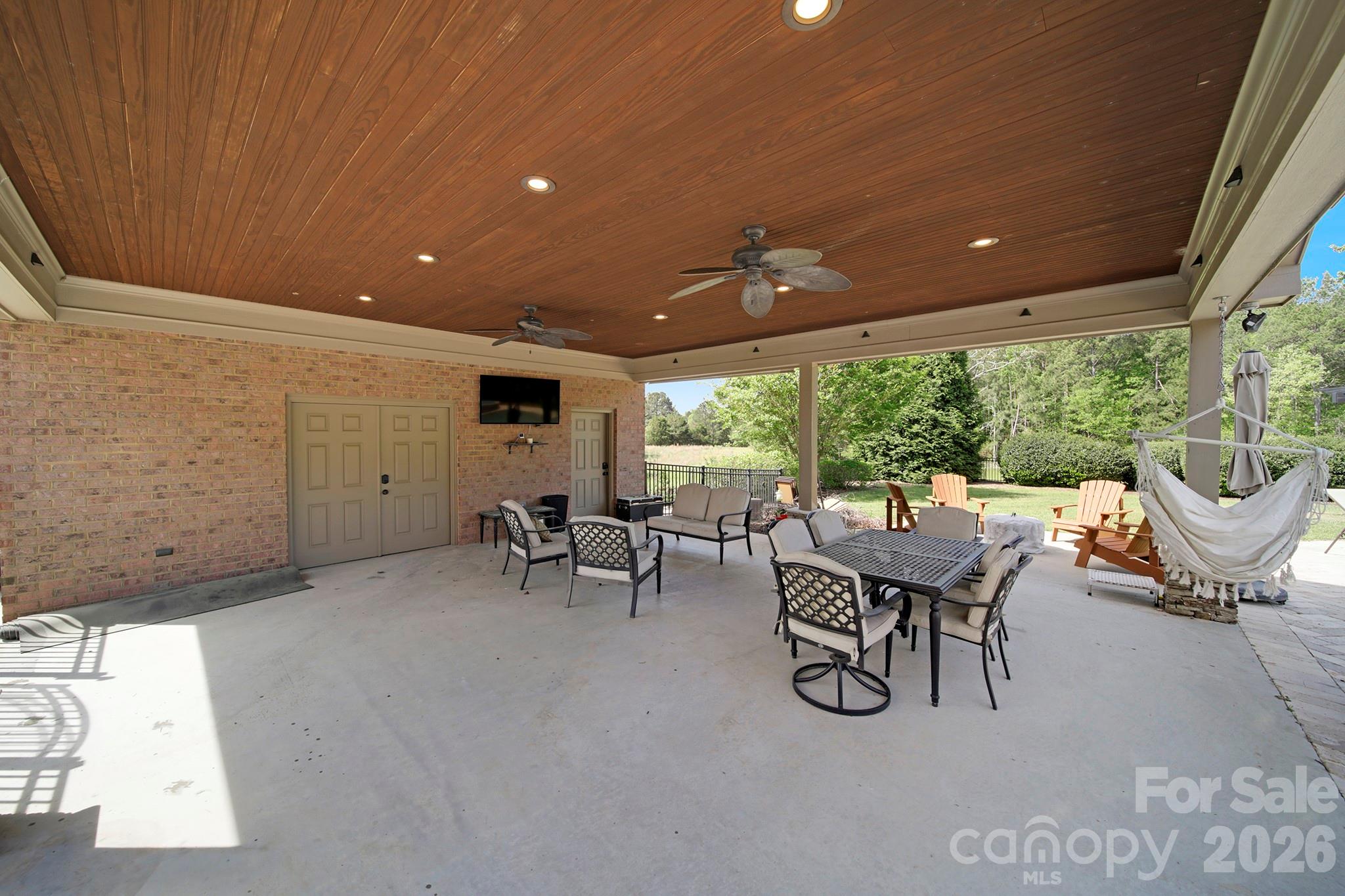 2407 Robert Usher Road Lancaster, SC 29720 - Photo 33 of 47 a view of a patio with table and chairs