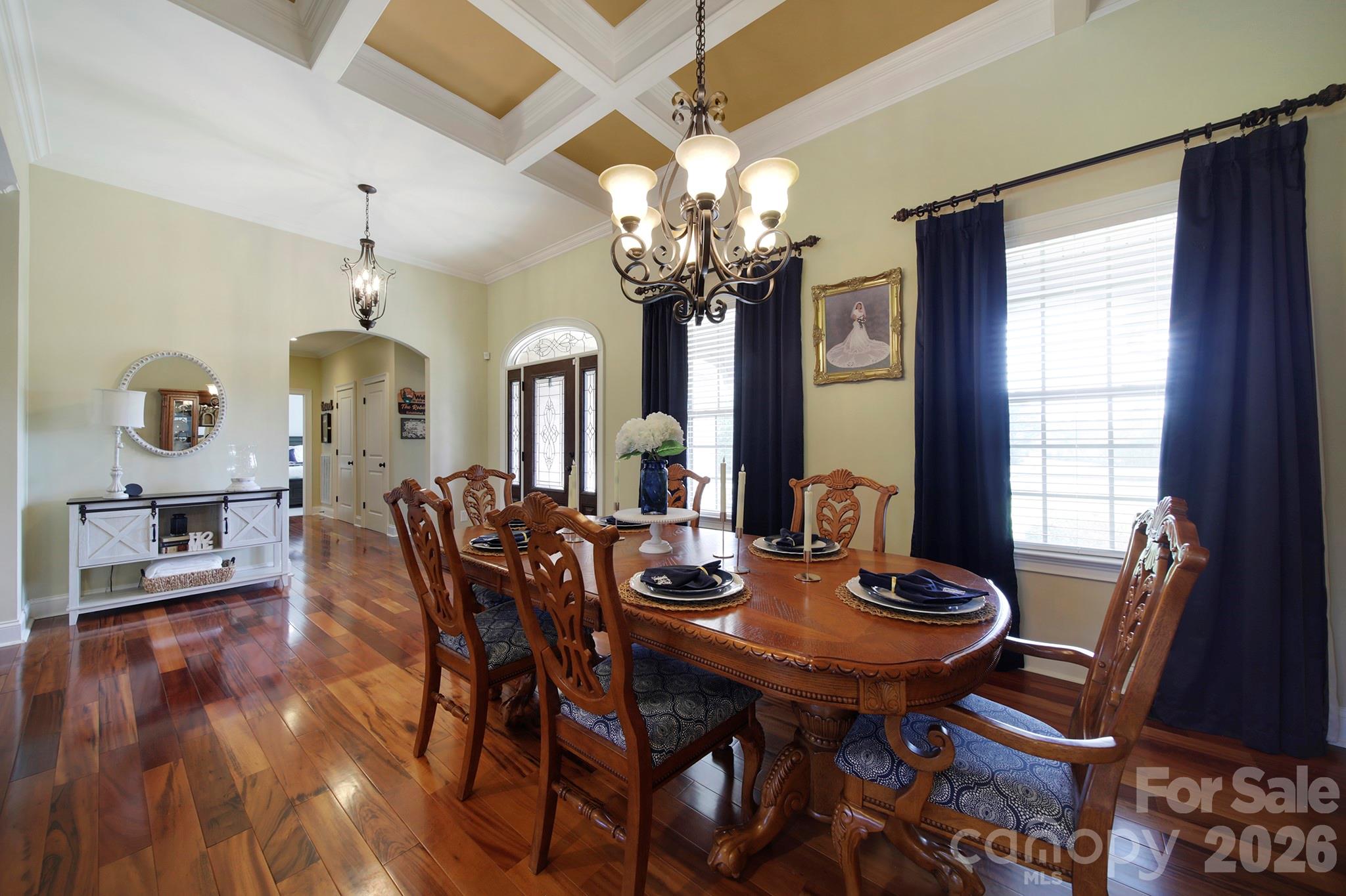 2407 Robert Usher Road Lancaster, SC 29720 - Photo 6 of 47 a view of a dining room with furniture and a chandelier
