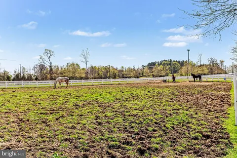 a view of a house with a park